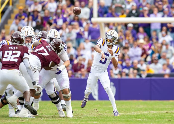 LSU Quarterback Jayden Daniels throws against Texas A&M.